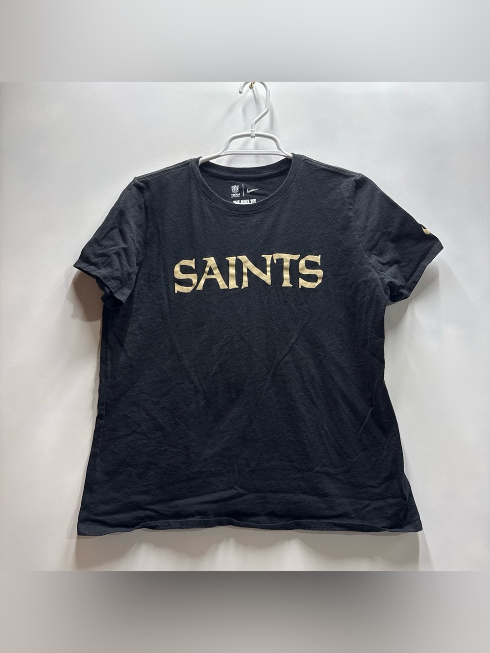 The Nike Tee NFL Men’s Black T-Shirt with Gold Saints